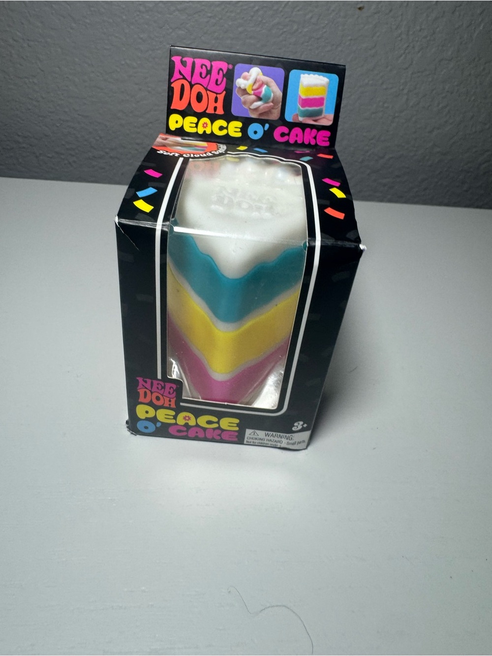 Nee Doh Peace O' Cake Scented Squishy Plush Toy - White, Blue, Yellow, Pink